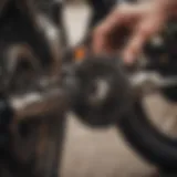 Close-up of a motorcycle chain being degreased