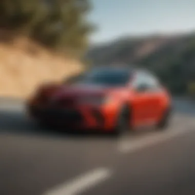 Dynamic Performance on the Road Dynamic action shot of the 2022 Corolla Apex on a winding road