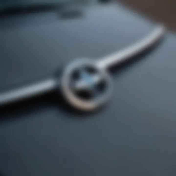 A close-up of a Subaru logo on a car hood, symbolizing reliability and performance.