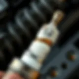 Close-up of a spark plug showcasing wear and tear
