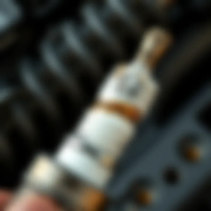 Wear Analysis of Honda Accord Spark Plug Close-up of a spark plug showcasing wear and tear