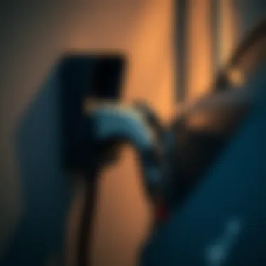 Detailed view of electric car charger and wall outlet