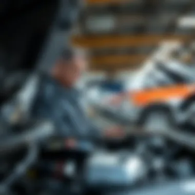 Inspecting Vehicle Parts for Junking A person inspecting car parts before junking a vehicle
