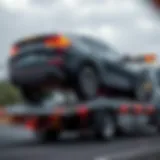 A sleek vehicle being loaded onto a tow truck
