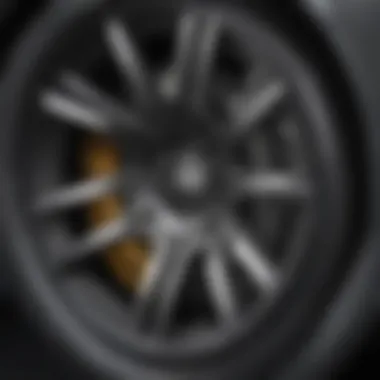 Close-up of a scratched alloy wheel showing texture and damage